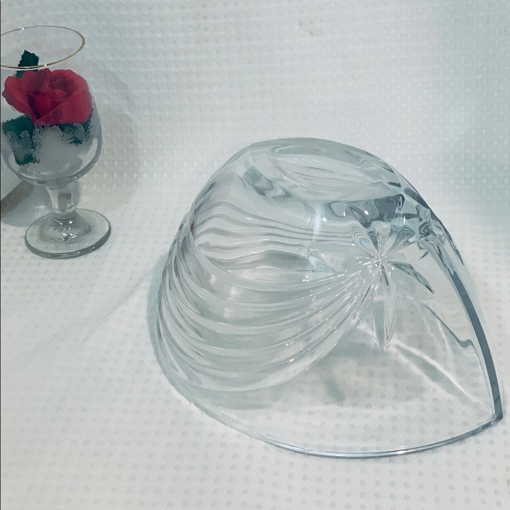 This is a beautiful glass fruit bowl.